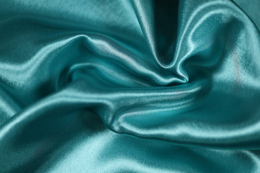 Türkis Krepp Satin Stoff mit Glanz