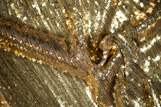Paillettenstoff in Gold – glänzend, hochwertig und perfekt für festliche Kleidung