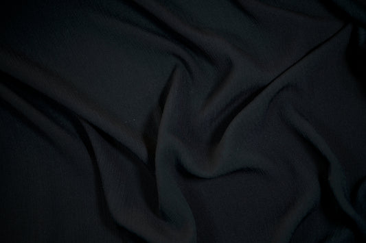 Krepp Viskose in Schwarz – weich, fließend und perfekt für Kleidung.