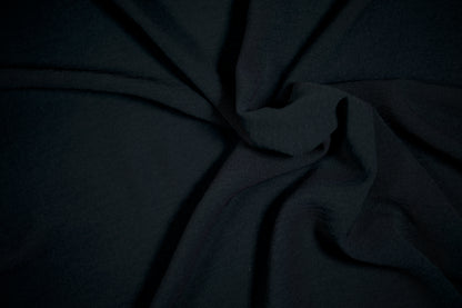 American Crepe Stoff Schwarz – klassisch und elegant
