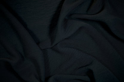 Schwarzer Stoff für Business- und Abendmode
