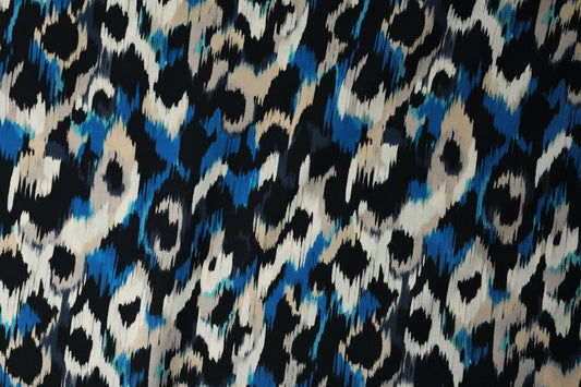 Bunter Viskose: Animalprint in Blau-Beige – perfekt für Blusen, Röcke und Accessoires