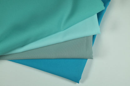 Polyester Panama Stoffe in Türkis-, Mint- und Aquatönen – harmonische Farbpalette für kreative Deko- und Nähprojekte