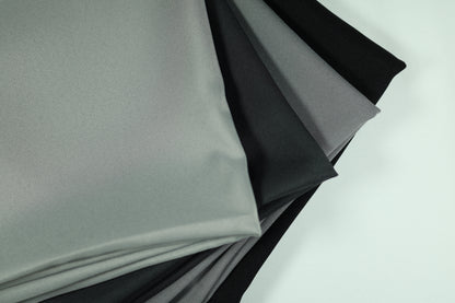 Polyester Panama Stoffe in Grau und Schwarz – elegante Kombination für stilvolle Raumgestaltung